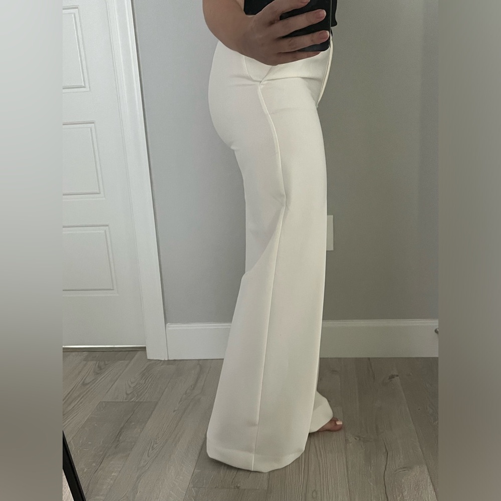Cream palazzo pants from Mango